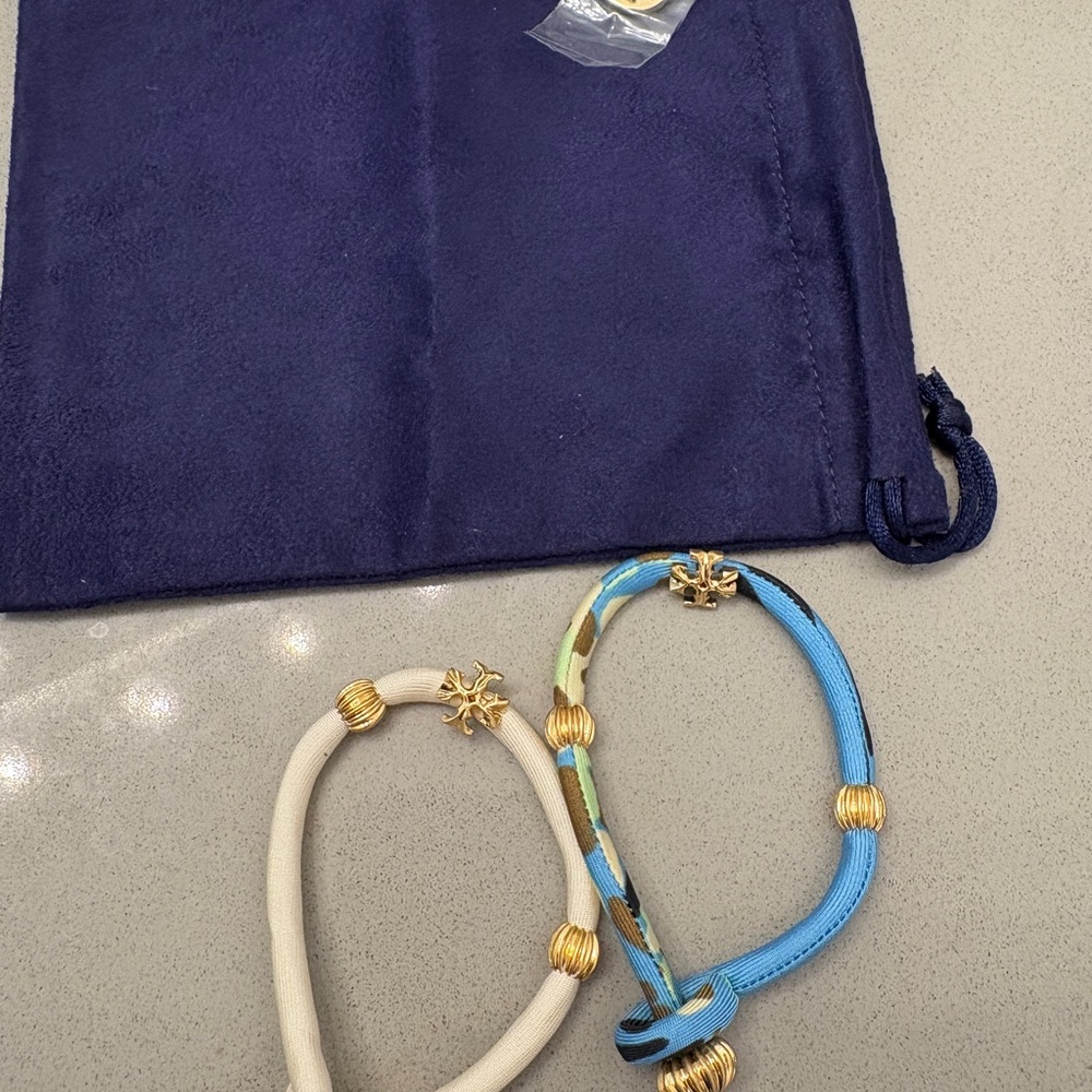 Tory Burch Gold and Blue bracelets